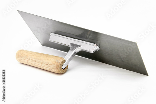 isolated of german style lute trowel over white background photo
