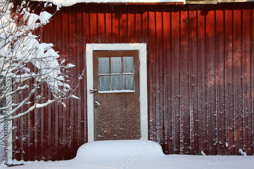 Wall of the house covered with rime