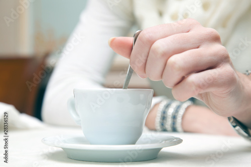 Woman taking a break with a cup of coffee