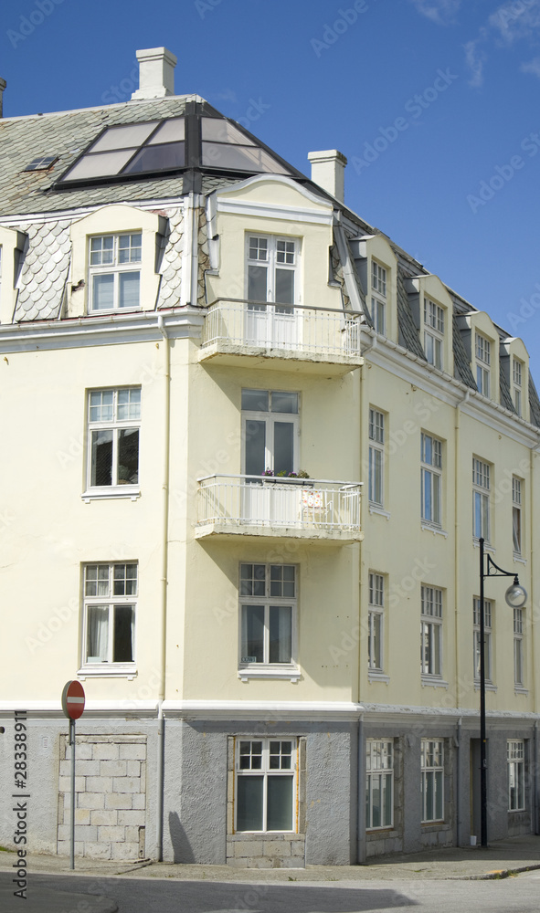 Old apartment building with modern roof window