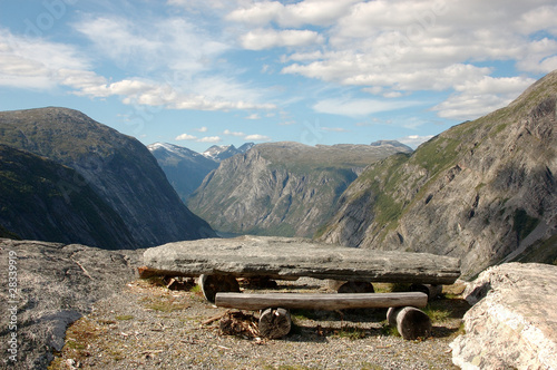 Picnic table on top of a mountain photo