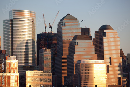 Manhattan Financial District at sunset from Jersey photo