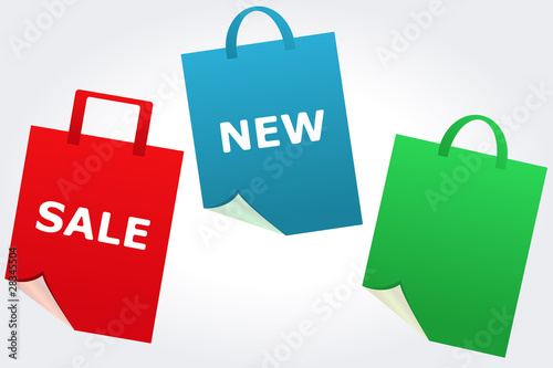 Signs "sale" and "new" on stylized shopping bags