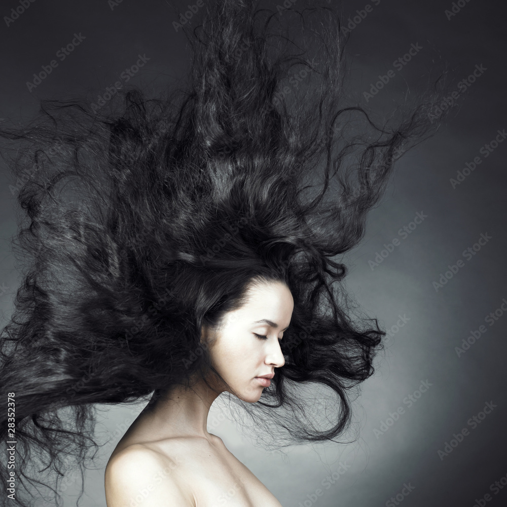 Fototapeta premium Beautiful woman with magnificent hair