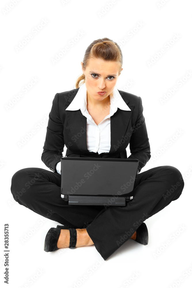 Laying on floor thoughtful modern business woman using laptop. Laying on floor thoughtful modern business woman using laptop.