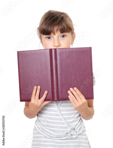 Thinking little Girl with a book © motorolka