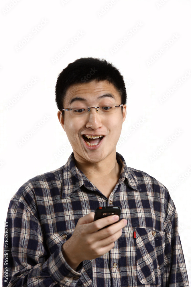 casual man smiling feel surprised on a mobile phone isolated ove casual man smiling feel surprised on a mobile phone isolated ove