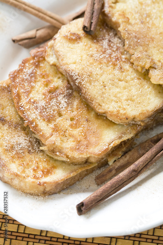 Tasty toast with cheese and cinnamon