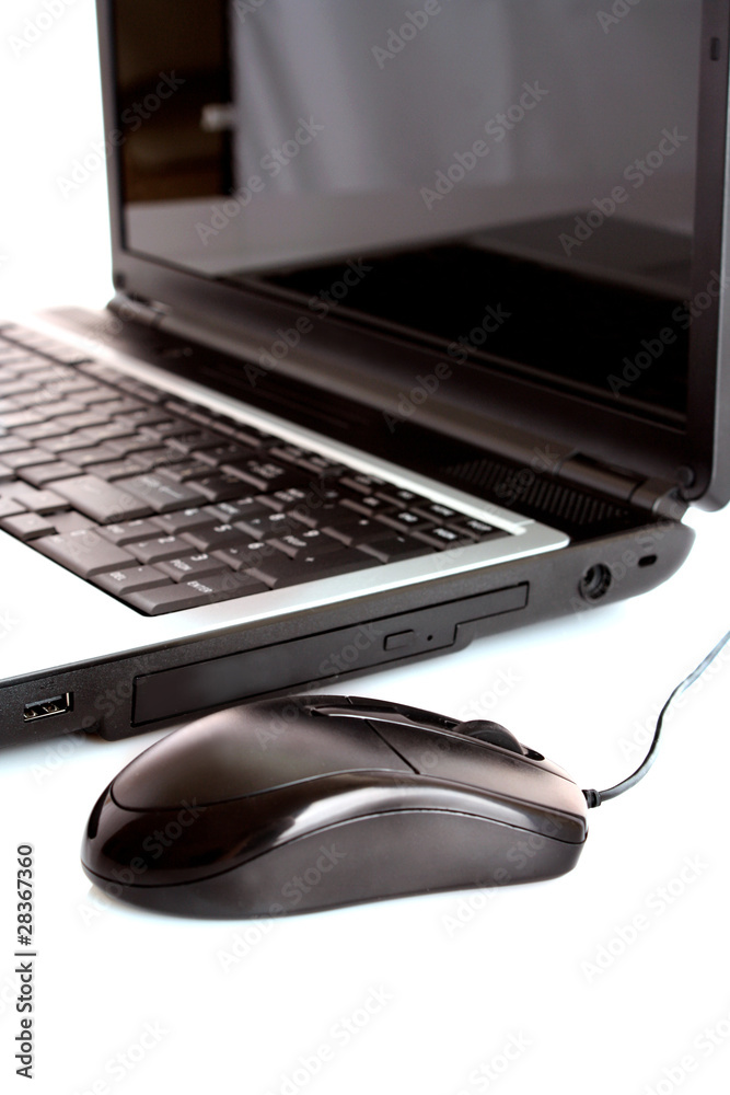 Black laptop and mouse isolated on white Black laptop and mouse isolated on white