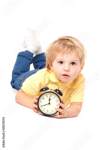 Little cute boy with clock