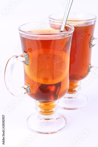 Two glasses of tea with lemon