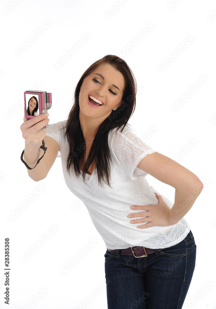 beautiful casual woman taking her own pictures on a digital phot beautiful casual woman taking her own pictures on a digital phot