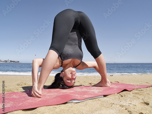 Bikram yoga dandayamana bibhaktapada pashimottanasana photo