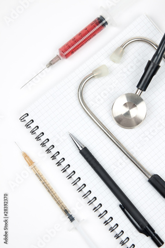 Notebook and stethoscope