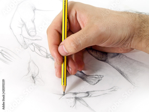 The photo of drawing hand