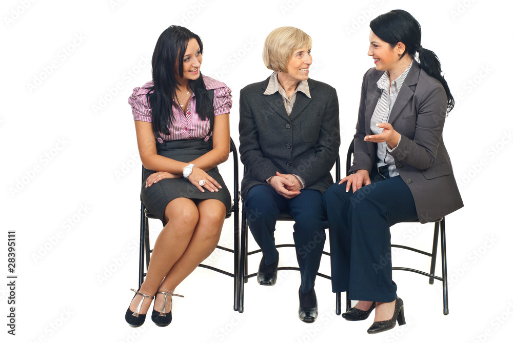 Fototapeta premium Three business women having conversation