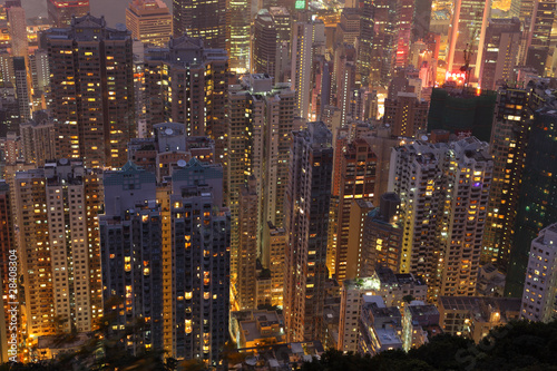 Aerial view over highrise buildings at night