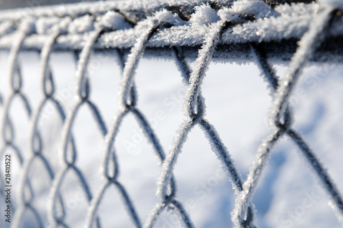 Frost on a fence © Jaroslaw Grudzinski