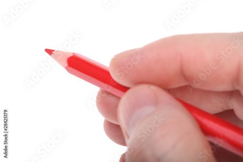 red pencil in hand