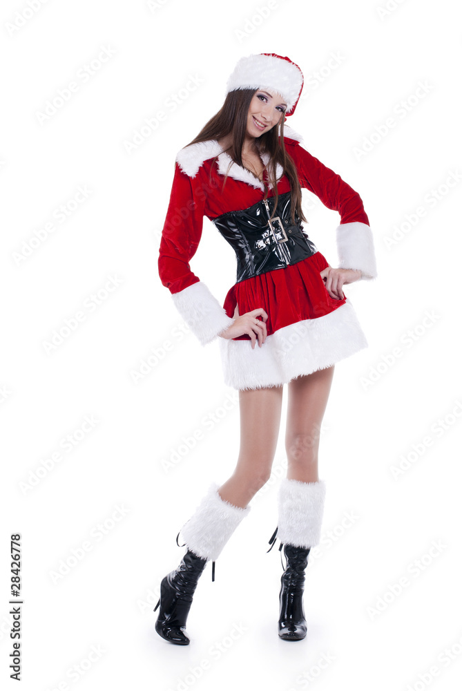 beauty girl in santa hat over white background.. beauty girl in santa hat over white background..