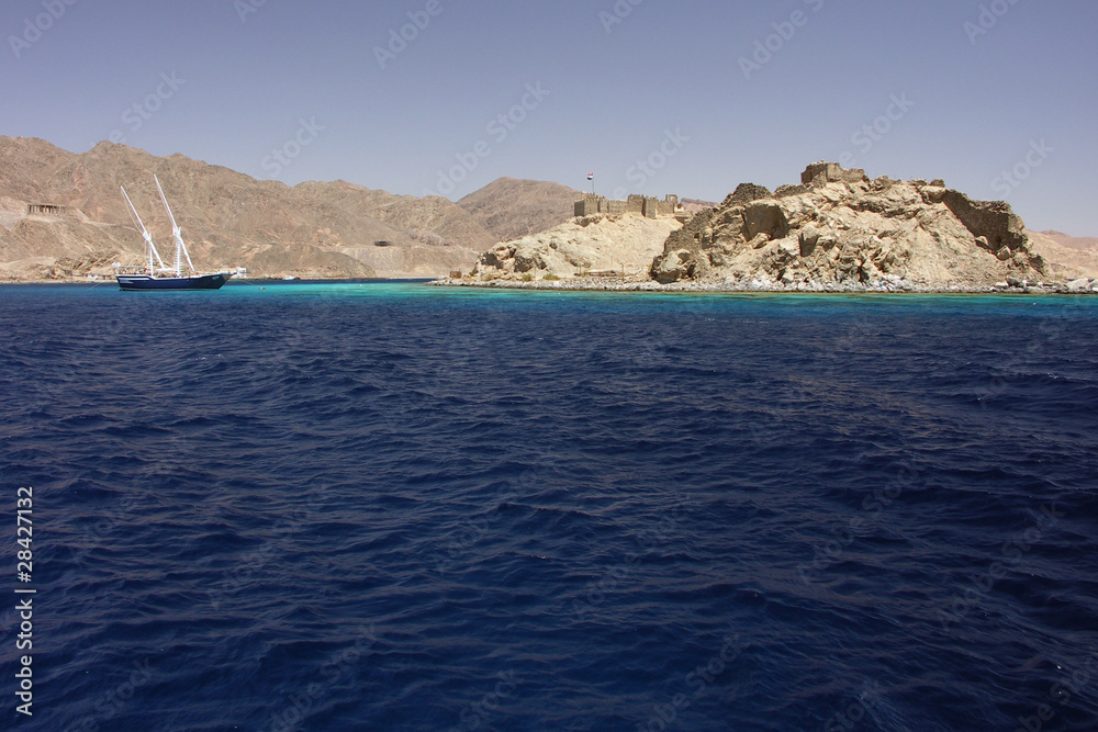 Naklejka premium island with stronghold and boat in Red Sea - Egypt, Africa