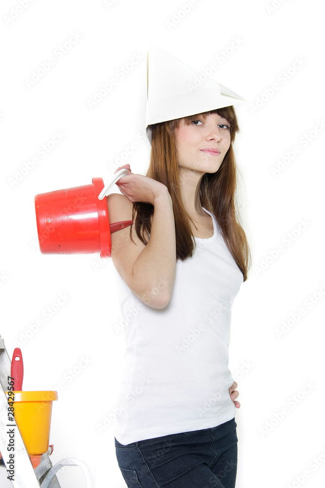 studio portrait of attractive young woman ready for painting studio portrait of attractive young woman ready for painting