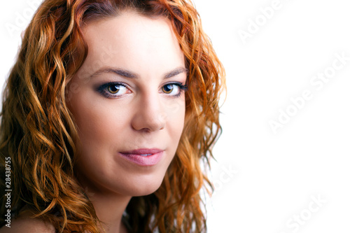 portrait of a beautiful happy young girl with red hair