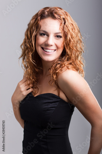 beautiful happy young girl with red hair