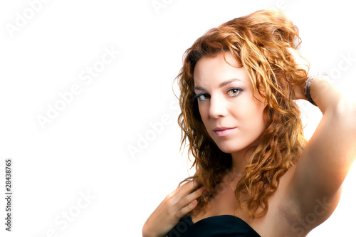 portrait of a beautiful happy young girl with red hair