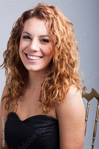 beautiful happy young girl with red hair