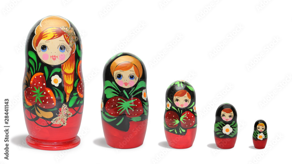 Red russian nesting dolls in line