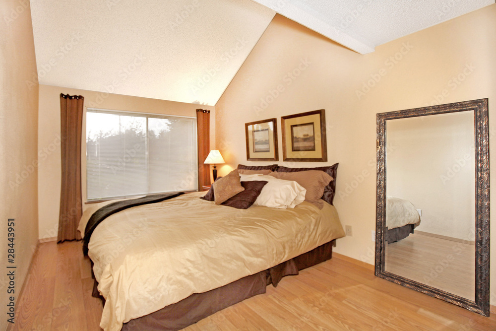 Bedroom with large mirros