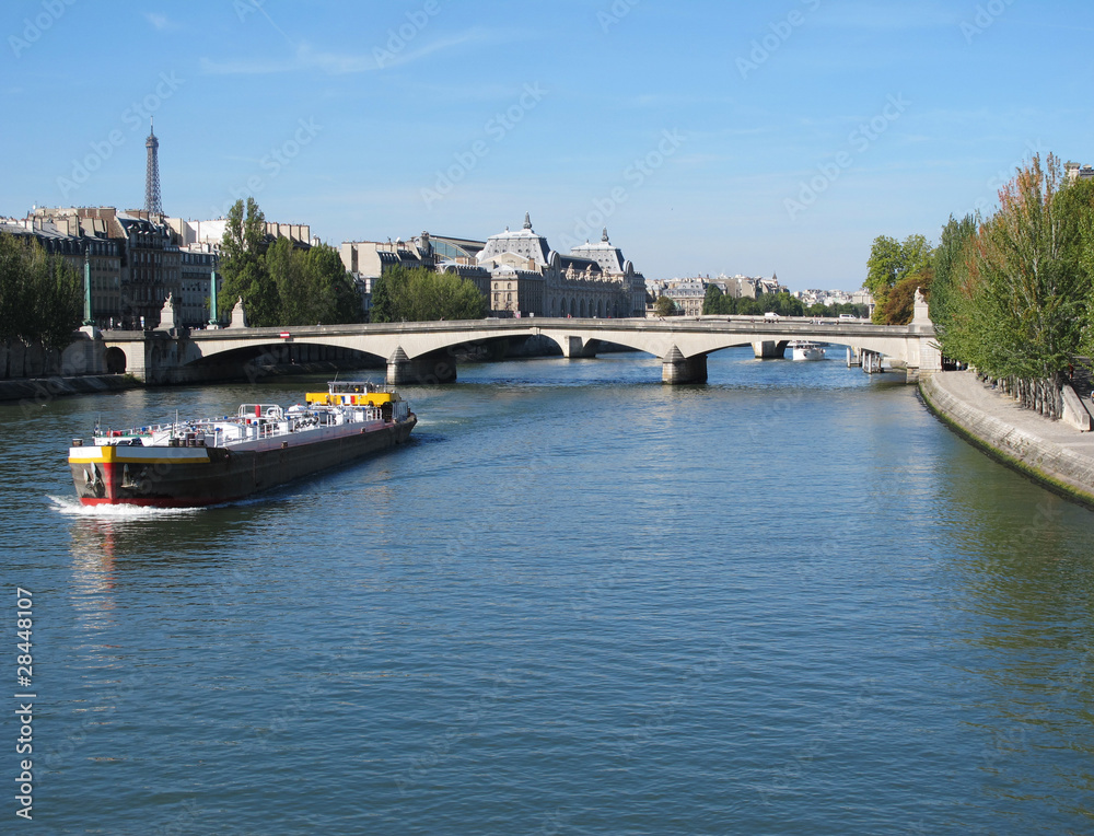 View of the Louvre Museum and Eiffel Tower at the Seine River