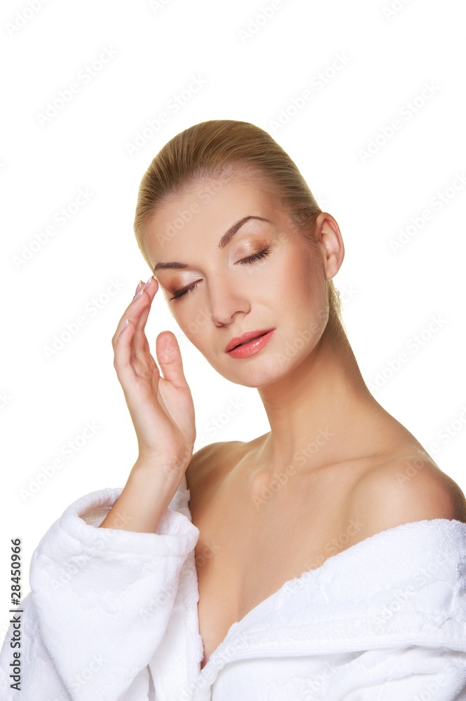 Beautiful blond woman touching her face Beautiful blond woman touching her face