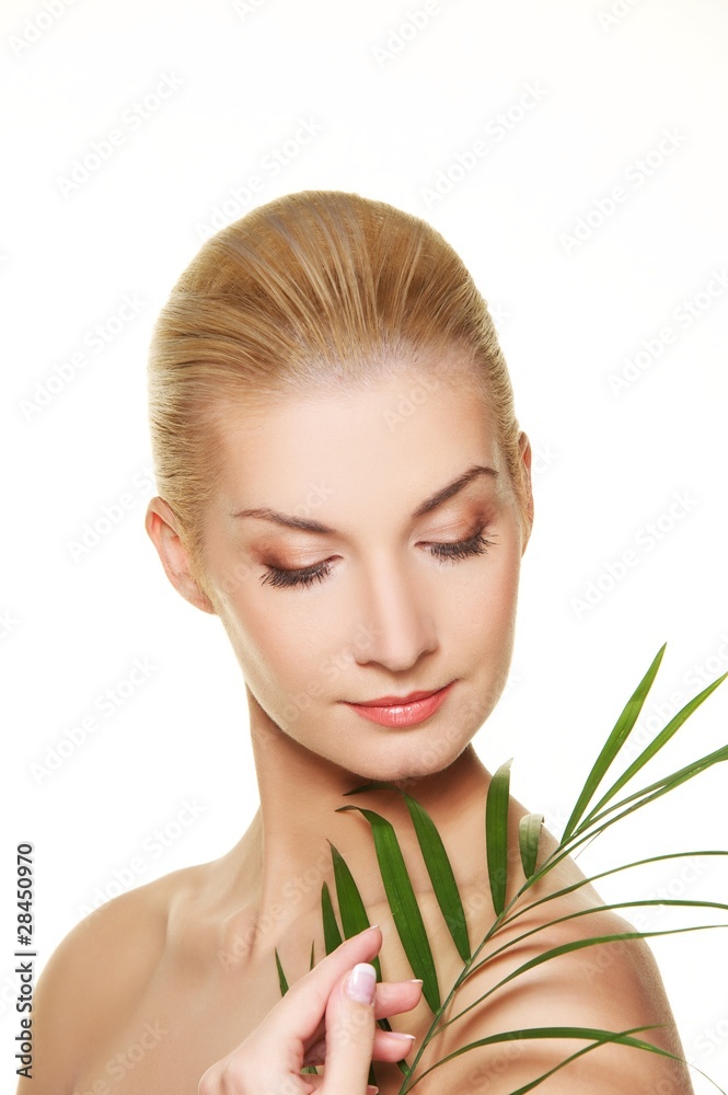 Beautiful woman with green plant Beautiful woman with green plant