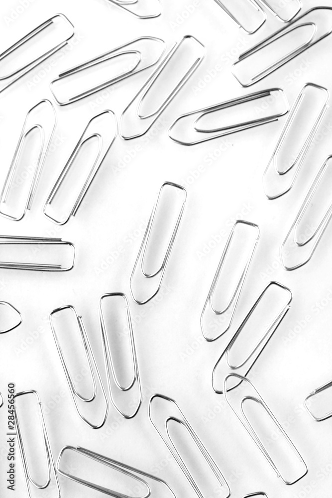 many paper clip isolated on white