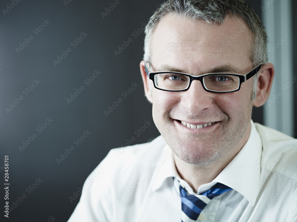confident businessman smiling at camera confident businessman smiling at camera