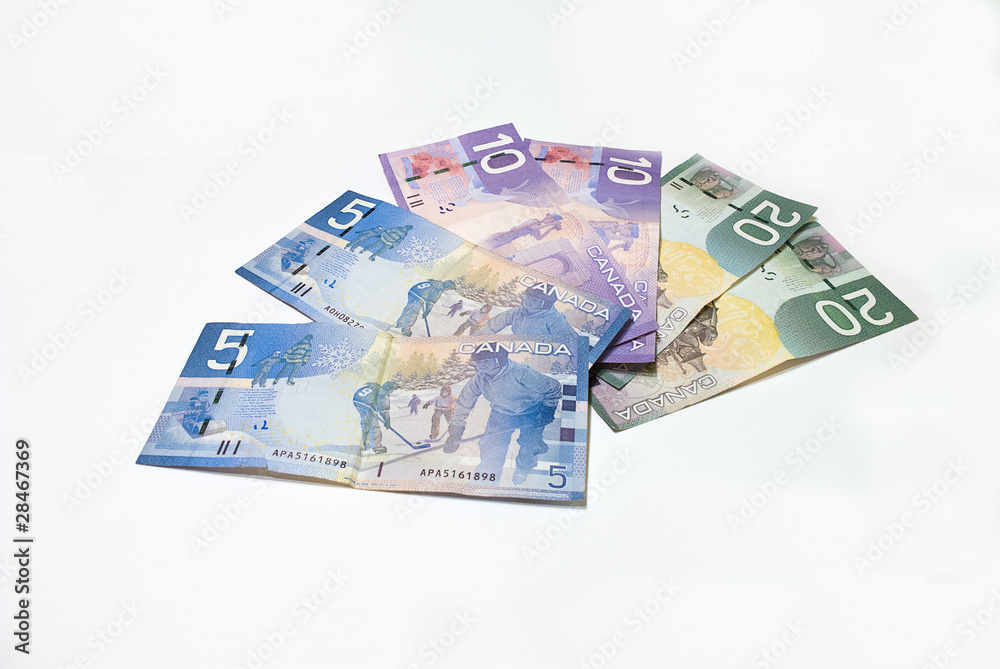Canadian Money against white background Canadian Money against white background