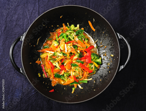 wok with colorful vegetables photo
