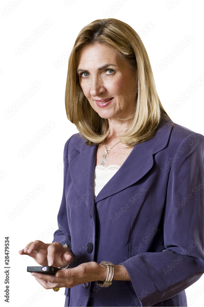 Woman sending text message with mobile telephone Woman sending text message with mobile telephone
