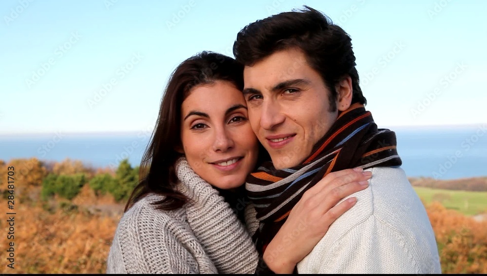 Couple embracing each other outside Couple embracing each other outside