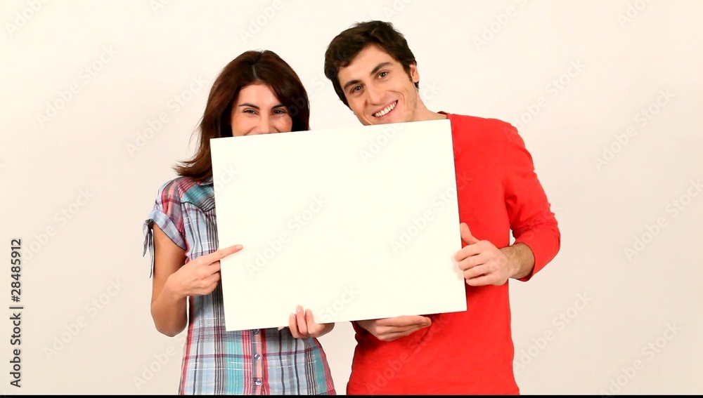 Couple showing white board