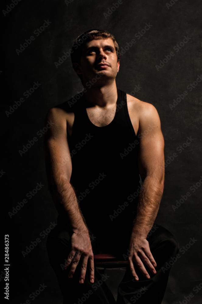 Man with an athletic body, studio portrait Man with an athletic body, studio portrait