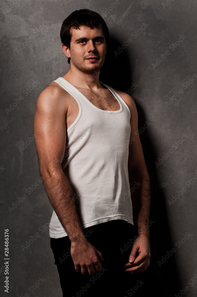 Man with an athletic body, studio portrait Man with an athletic body, studio portrait