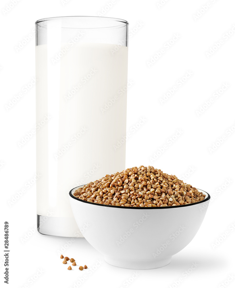 Isolated buckwheat. Glass of milk and white bowl of buckwheat isolated on white background Isolated buckwheat. Glass of milk and white bowl of buckwheat isolated on white background