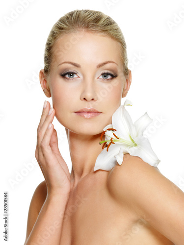 Beauty face of the young beautiful woman with flower #28501564
