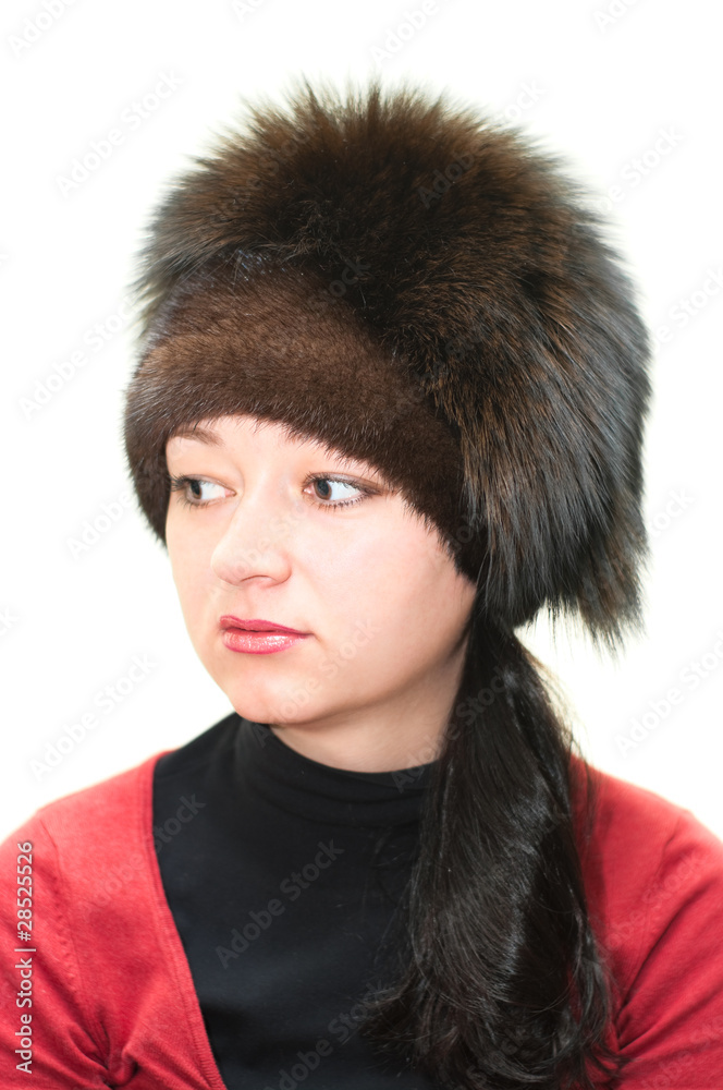 Woman in fur hat isolated on white background Woman in fur hat isolated on white background