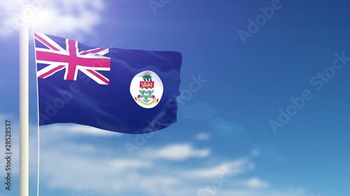 Cayman Islands flag waving. Sky background.