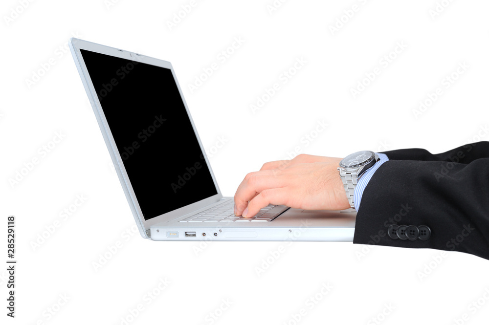 Businessman is working on a glossy laptop