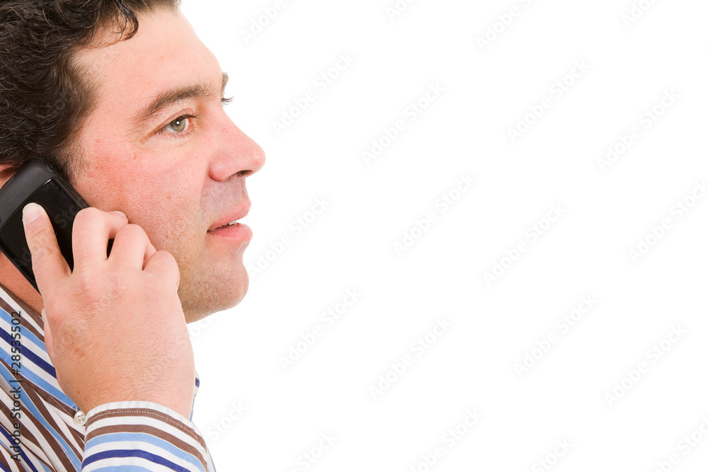Fototapeta premium Close up of a mature man on the phone in white background